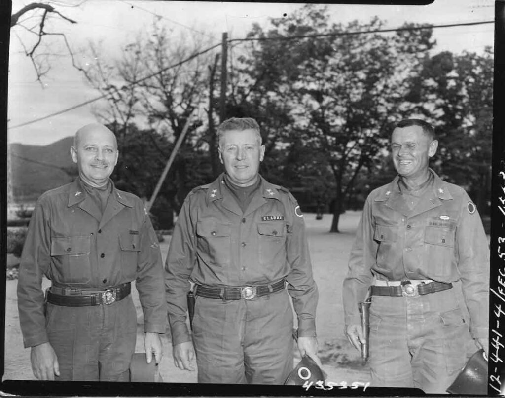 Clarke (center) became commanding general of I Corps in Korea in April 1953. Here he is shown with Brigadier General Francis Howard, I Corps Provost Marshall (left), and Brigadier General Thomas Sherburne, commanding general of I Corps Artillery (right), 4 June 1953. (National Archives)