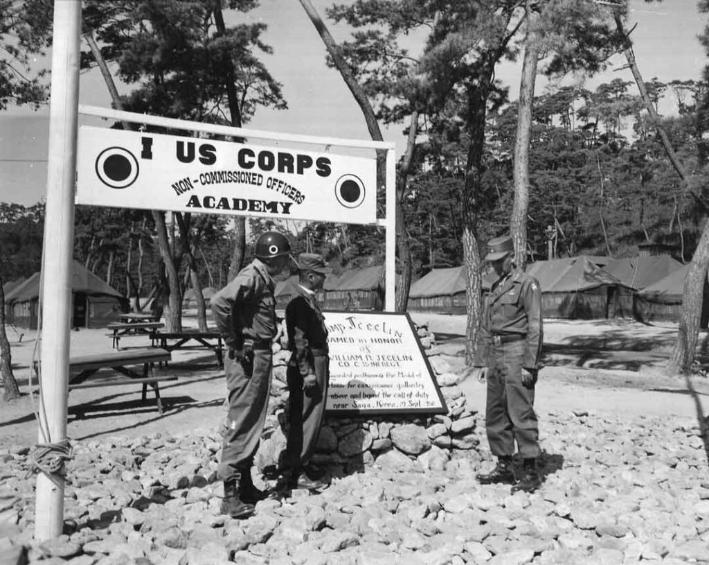 Lieutenant General Clarke (left) and Lieutenant General Lee Hyung-geun (center), commanding general of the Republic of Korea I Corps, discuss I Corps’ new Noncommissioned Officers Academy with General Maxwell D. Taylor, commanding general of Eighth Army, 26 September 1953. (National Archives)