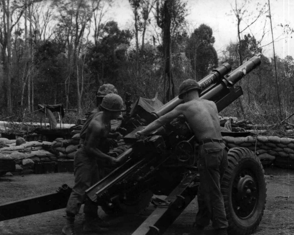 The M102 was intended to replace the heavier M101A1 105mm howitzer (left). Designed in the 1920s, the M101A1 was essentially the same 105mm howitzer that equipped American field artillery units in World War II and the Korean War. (National Archives)