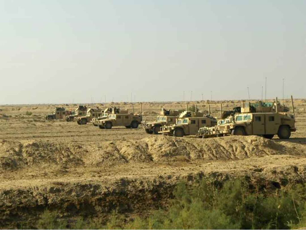 Alpha Troop Humvees link up with Charlie Troop south of Phase Line S1. (Mike Few)