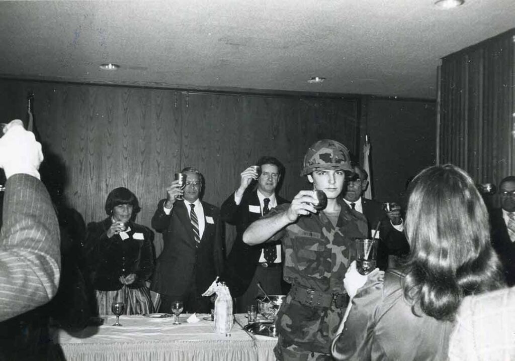 Members of the 5th toast the President of the United States during an informal using the 5th PSYOP Group’s regimental silverware.