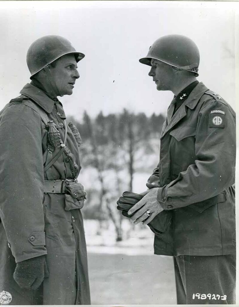 Major General Matthew B. Ridgway (left), commander of XVIII Airborne Corps, and Major General James M. Gavin, commander of the 82d Airborne Division, engage in conversation before a medal presentation ceremony in Belgium, 20 January 1945, as the Battle of the Bulge was concluding. With Ridgway in England at the opening of the German Ardennes counteroffensive in December 1944 , Gavin temporarily took command of XVIII Airborne Corps. (National Archives) 