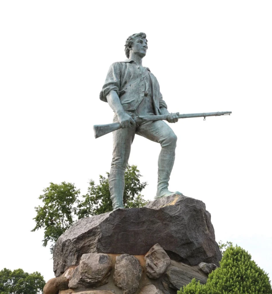 The Minuteman Statue is a life-size bronze figure of a colonial farmer holding a musket, also known as Captain John Parker. The status is above a pile of rocks that overlooks the area and is viewable all year.